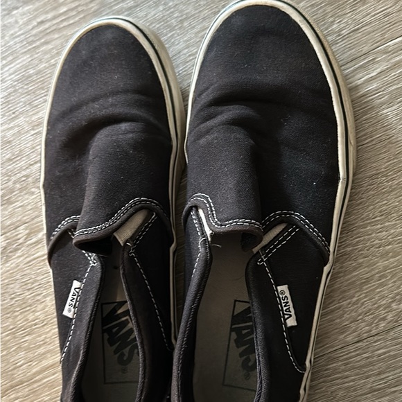 Men’s size 12 in shoes and women’s size 8 black slip on vans